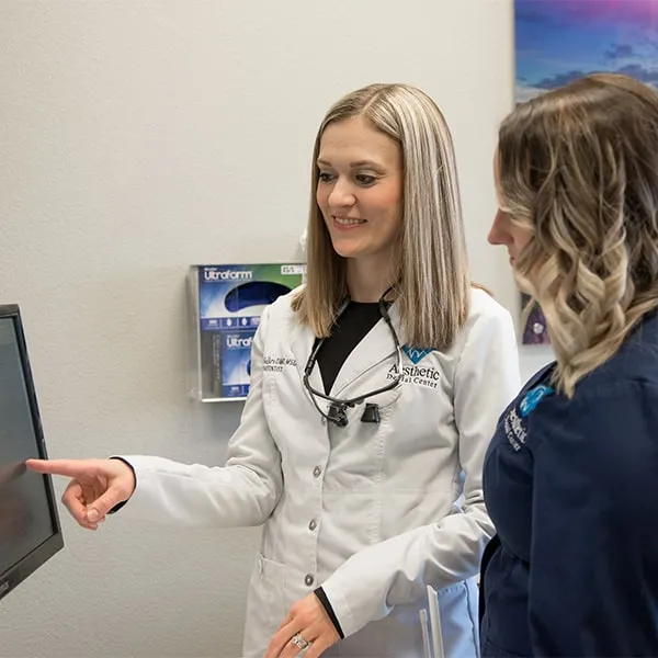 Dr. Sellers Discussing Dental Crowns With A Patient
