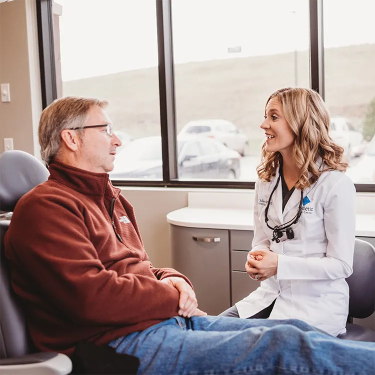 Dr. Sellers With A Patient At Implant Consult