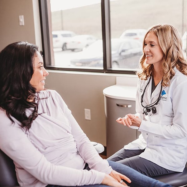 Bismarck Dentist - Dr. Sellers With A Patient